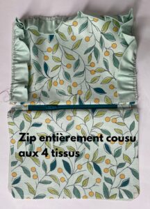 Zip entierement fixe a la trousse a volants.